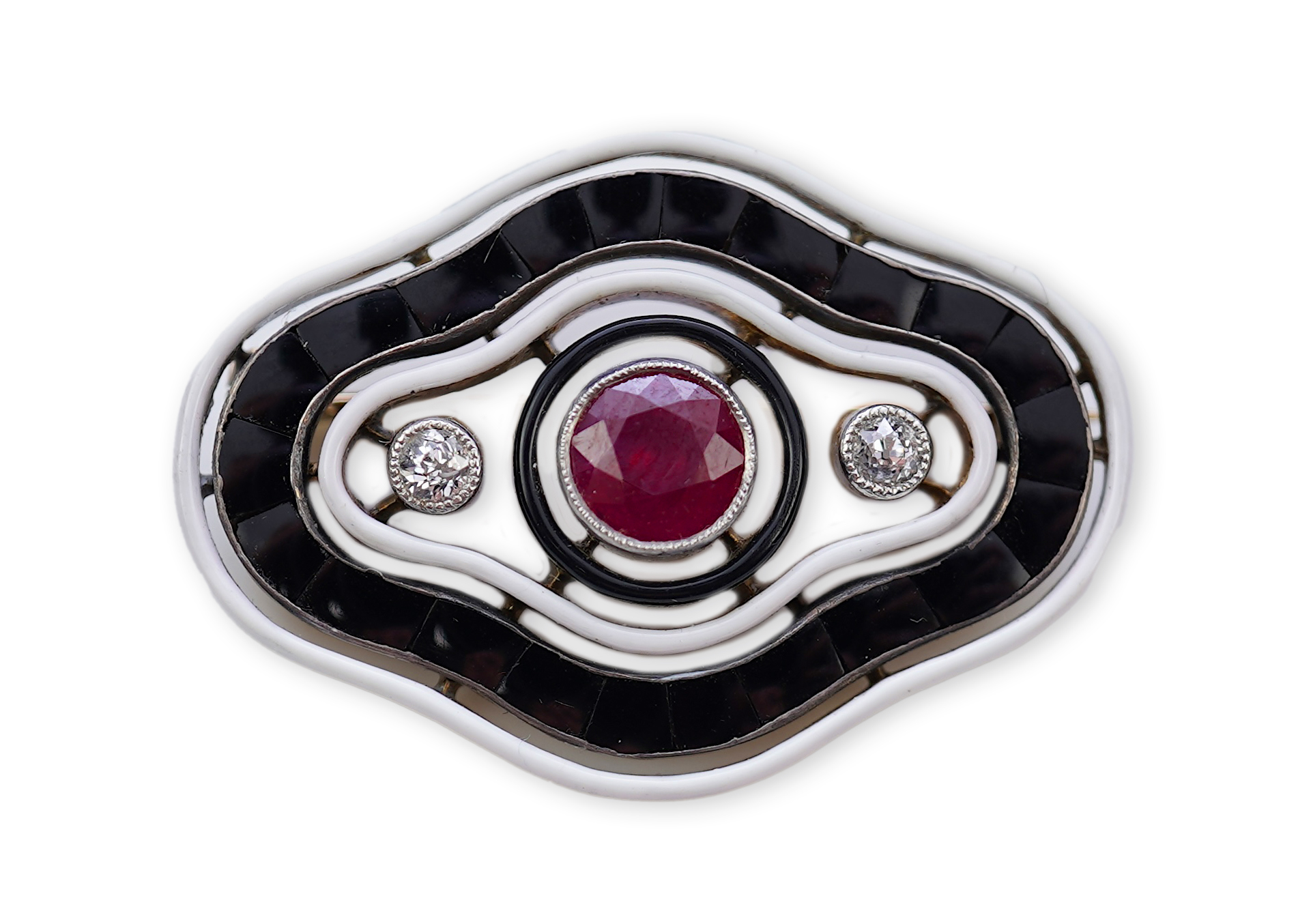 An unusual Art Deco onyx, enamel, ruby and diamond brooch, circa 1920